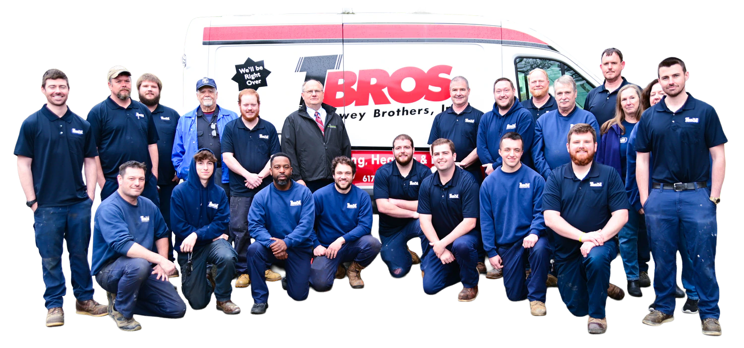 Trethewey Brothers plumbing and heating team standing in front of company truck